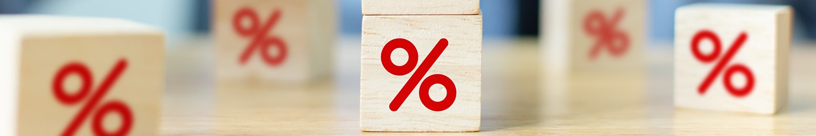 Percentage symbols on wooden blocks.
