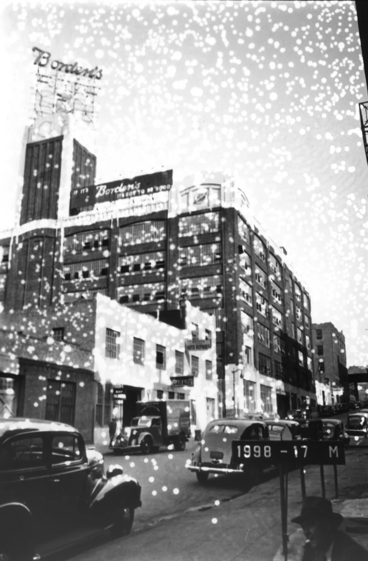 An old image of the Studebaker Building, c. 1940, when it was used as a milk-processing plant by the Borden's Dairy Company.